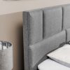 Headboard of the Emilia bed. Light grey fabric